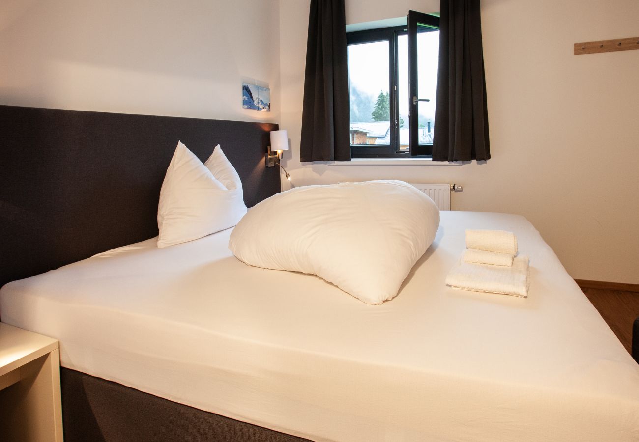 Slaapkamer Montan Chalet-Apartment